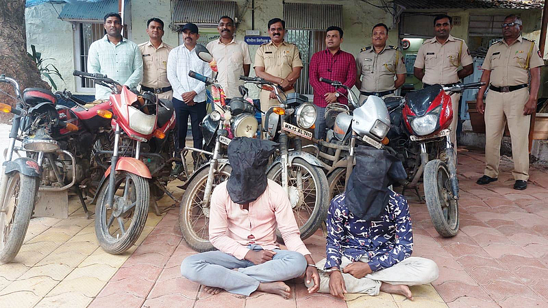 Police officers with the arrested bike thieves at yeola