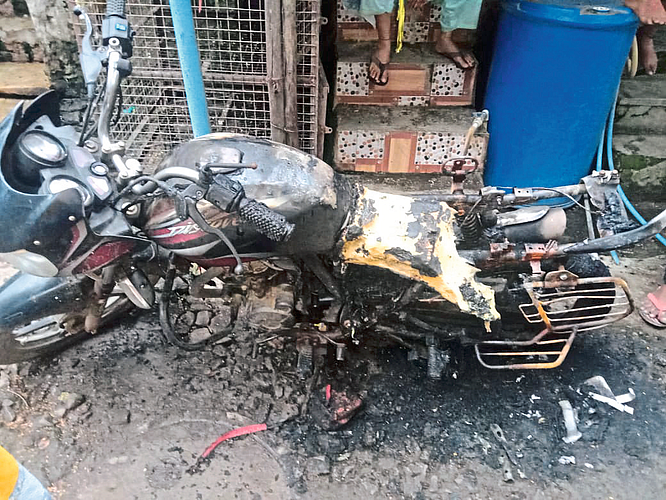 The burnt bike of Khatik from Shanipethe