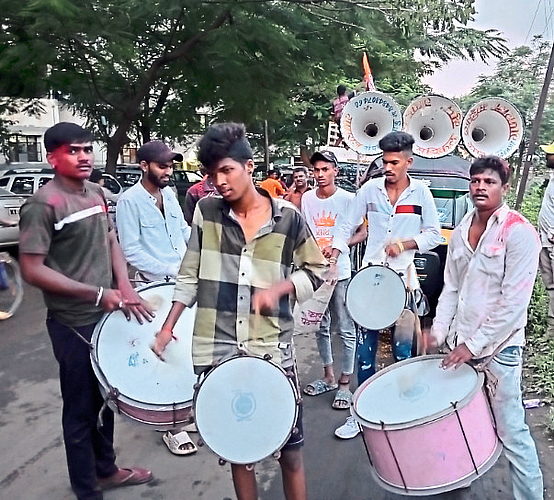 On occasion of Ganeshotsav Bappa's arrival procession, musicians playing drums