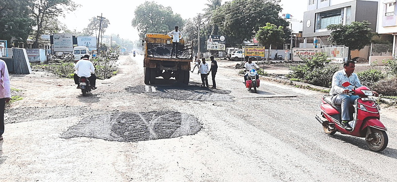 Employees of the department while erecting a bridge across Shantikesar Super Market.