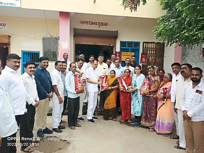 MLA Chimanrao Patil District Magistrate Vinay Gosavi Tehsildar Suchita Chavan Shaligram Gaikwad and officials while distributing the kit