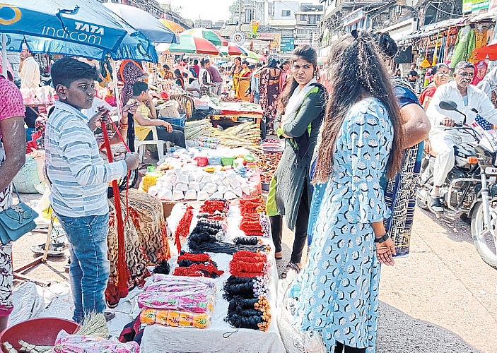 Citizens buying pooja materials for Diwali.