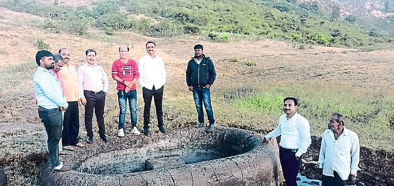 Local villagers and officials inspecting the cisterns found during the cistern search at wani gad