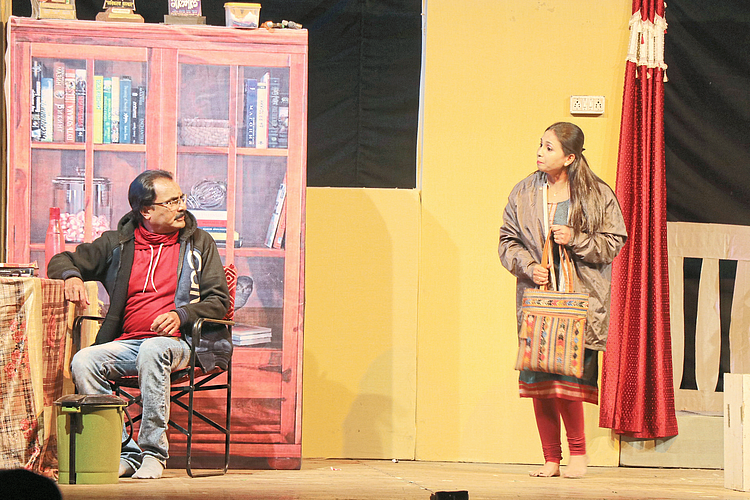 Actors performing scenes from the play 'Final Draft' at the drama festival organized by Kamgar Kalyan Mandal.