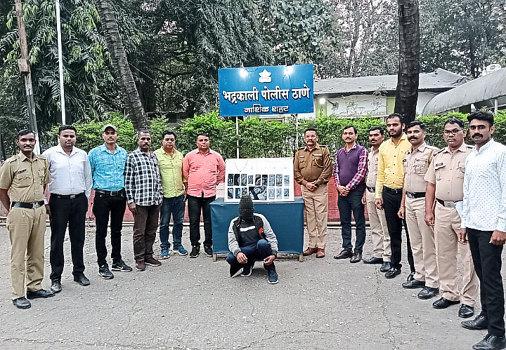 Suspect and team personnel along with the items seized from the suspect