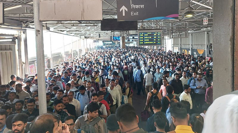 Ghatkopar metro station pedestrian bridge storm crowd mumbai
