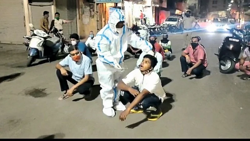 Citizens walking without masks were tested for antigen on the streets Manmad Nashik Corona News