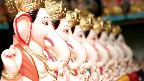 Ganesh idols in an artificial lake