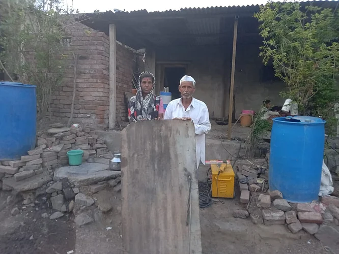 Feeling of couple towards old door of their home in Karmala