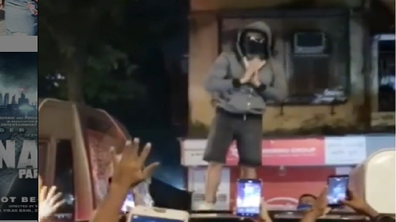 video viral Ranveer singh with grey hoodie shorts people surrounding his car
