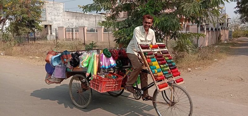 Gulmohammad Sheikh's business runs on a three wheeled rickshaw