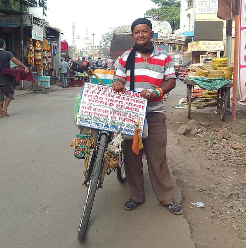 Nagraj Gowda preaching the message of world peace on a bicycle