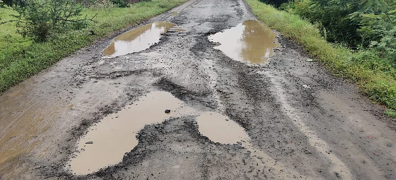 Sarpanch of Vadule Budruk Pradip Kale repaired the road