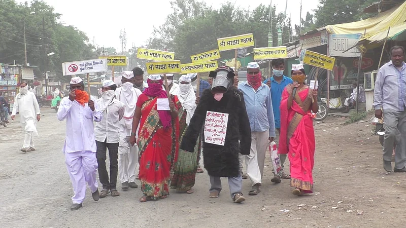 Tai Jadhav, a woman sarpanch of Gawadhala group gram panchayat in Mehkar city carried out the campaign.jpg