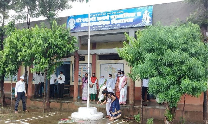 Flag hoisting by Vaishnavi Santosh Lahamge a girl who passed 10th in Rajur