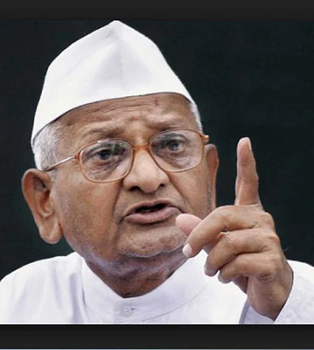 Why do the officials who came to the city meet Anna Hazare for the first time
