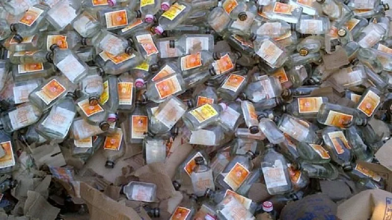 Wine smugglers fall down with wine on road