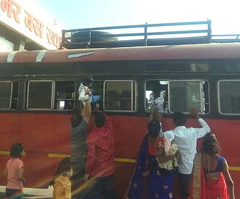 Crowds of passengers to take seats in the ST at the stand in Sangamner