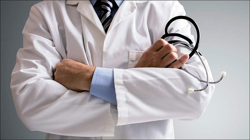 doctor ashraf badar dismissed for recommending condom for stomach complaint in ghatshila