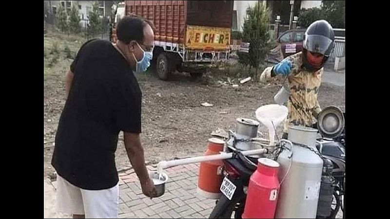 coronavirus lockdown milk man delivers milk unique way photo goes viral
