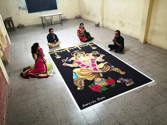 The Rangoli by giving five hours time every day four days