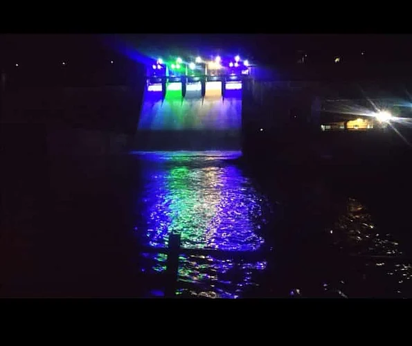 Electric lighting on the Nilwande reservoir in Akole taluka
