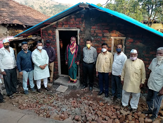 The dream of 70-year-old Venubai Oval's house in Dhanep village has come true due to the taluka administration and local people's representatives..jpg
