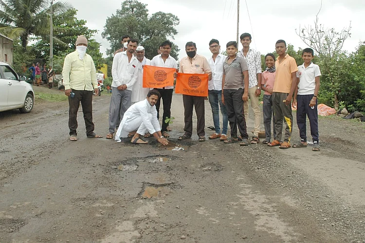 Plantation in a pit on Parner Supe Road