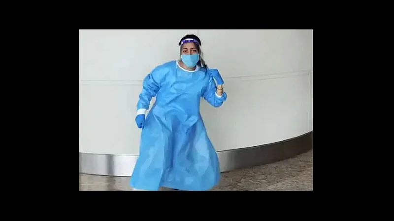 cricketer yuzvendra chahal fiance dhanashree verma dances at airport in ppe suit video viral
