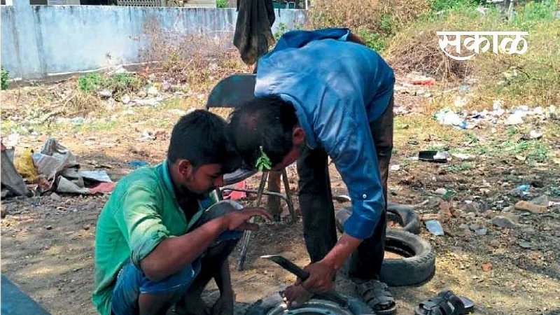Jahangir Ansari is running a garage overcoming paralysis}