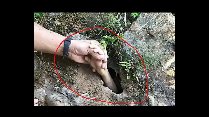 rescuer saves boy by grabbing his hand at china video viral