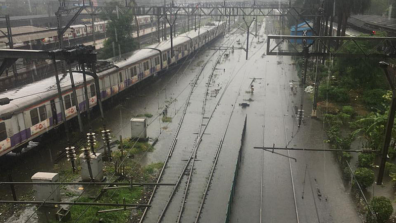 mumbai local train services hit due heavy rainfall