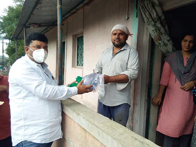Distribution of sanitizer and masks to 600 families through Sarpanch initiative
