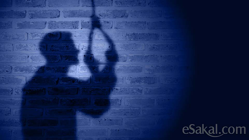 commits suicide by hanging himself