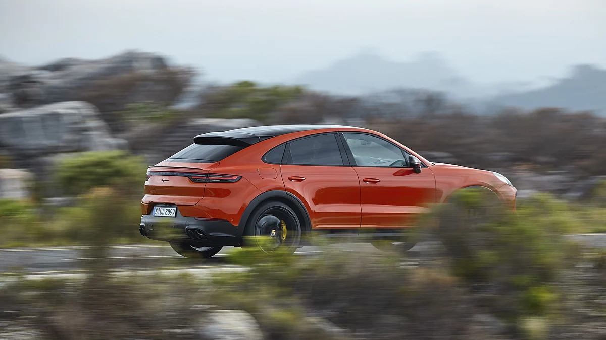 The roofline comes down to meet the boot-lid which also houses an active spoiler