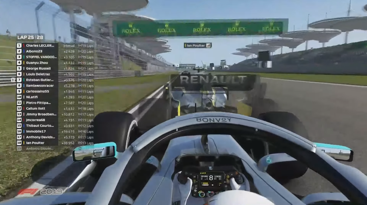 Esteban Guiterrez goes past back marker Ian Poulter during race three of the F1 Virtual GP at Shanghai