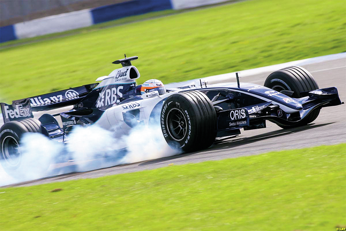 Narain locks a wheel during testing, 2006