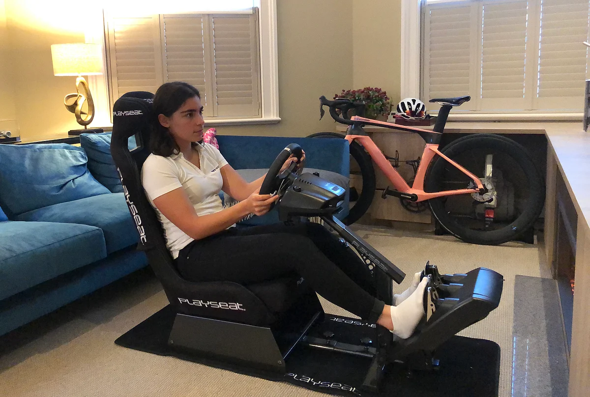 W Series driver Jamie Chadwick practicing on her simulator at home