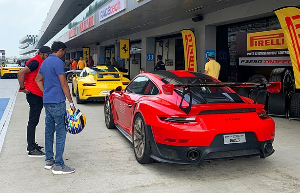 Getting track training from Aditya Patel in the GT 2 RS