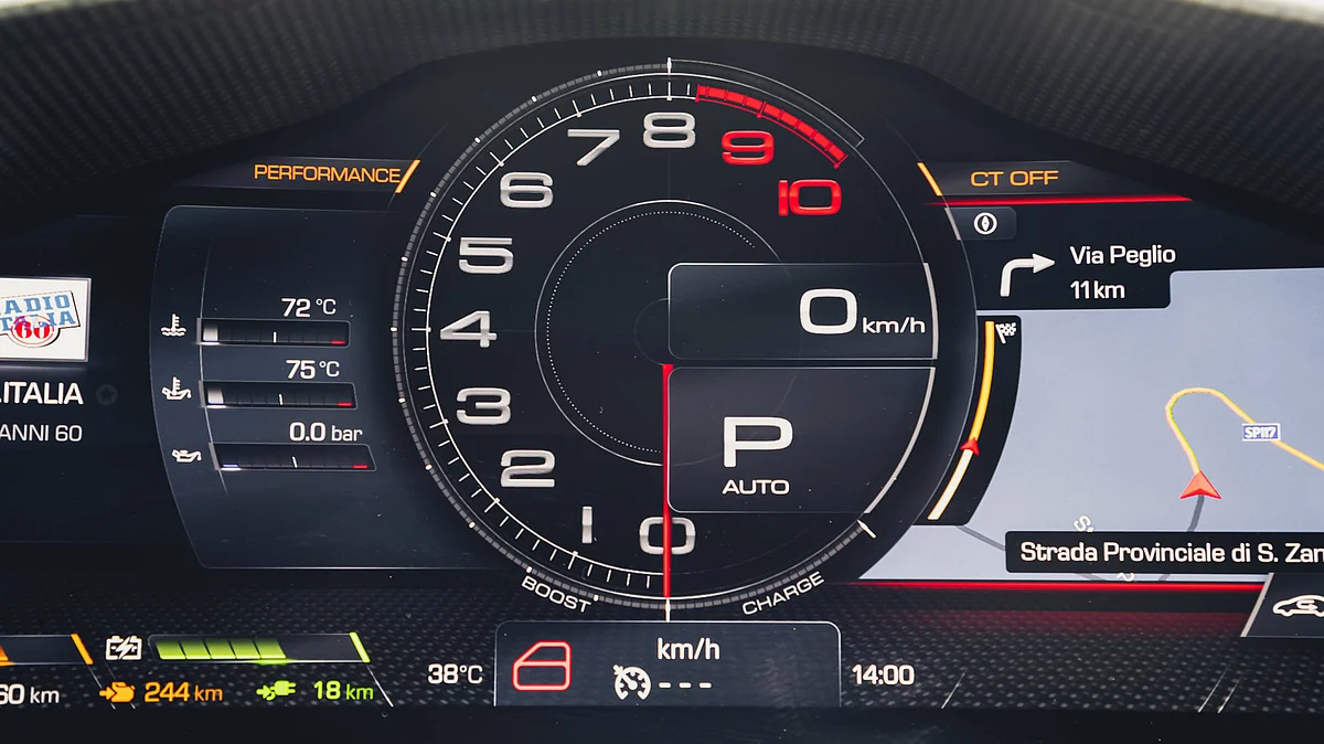 A 16-inch curved-screen display dominates the instrument binnacle