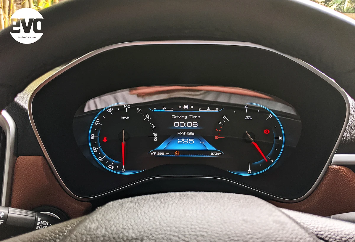 Analogue dials with a digital information display between them