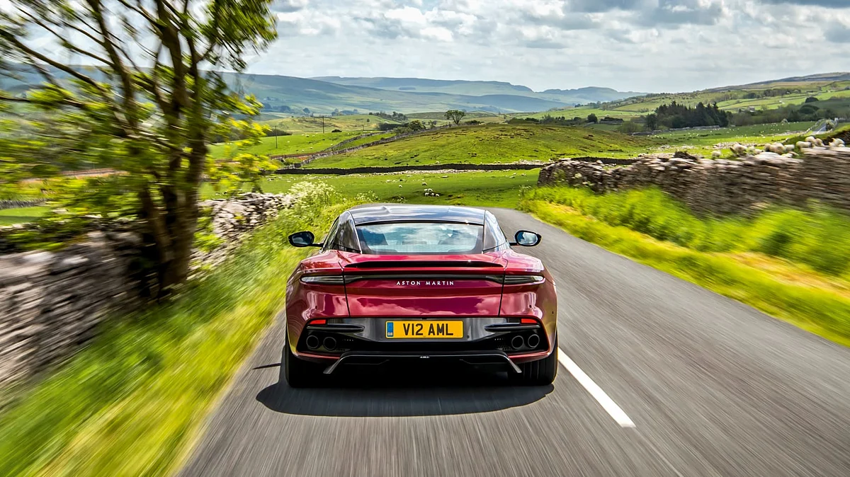 The Aston's gearbox reacts comparatively slower