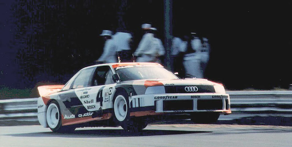 Hans Struck piloting an airborne Audi 90 Quattro at the 1989 IMSA series