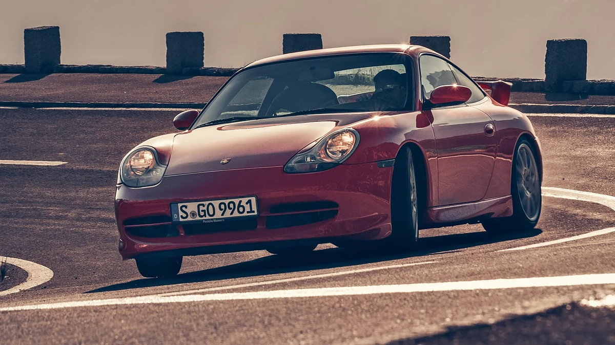 The way the front splitter skims the tarmac and the audacity with which the wheels are greased into the arches courtesy of a nudge of camber is magnificent