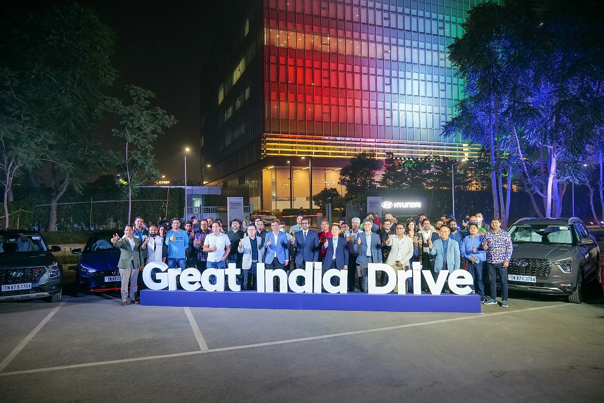 All smiles and commemorative poses before the Great India Drive begins