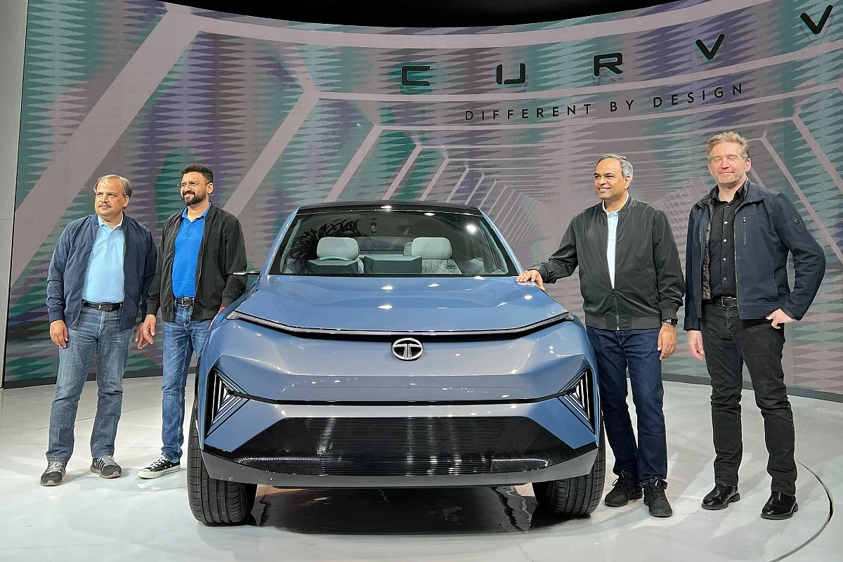 The people behind the Tata Concept Curvv posing with it