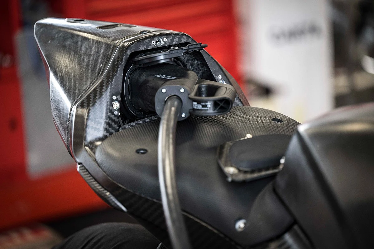 Charging socket hidden in the tail section