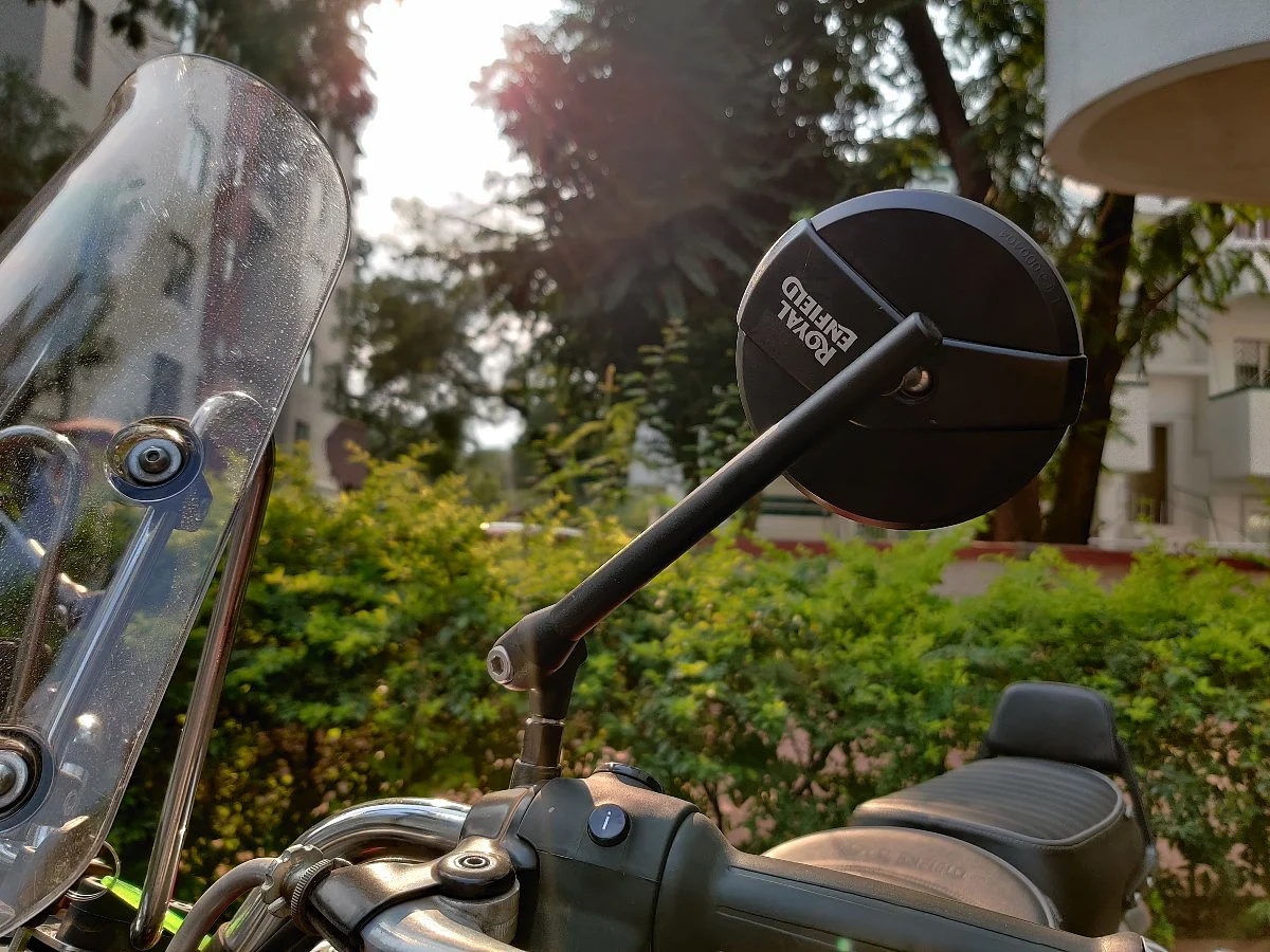 These rear-view mirrors don't vibrate much but visibility may be an issue if you are slightly broader
