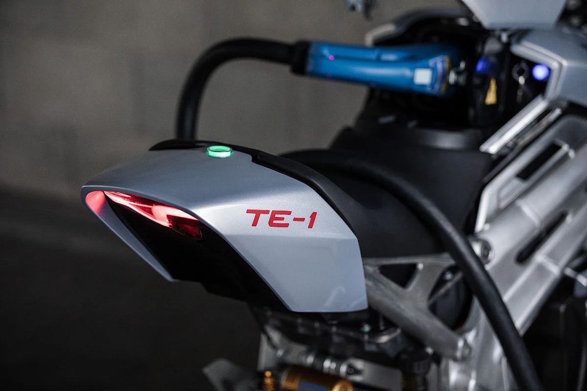 The tail-lamp is reminiscent of most Triumph motorcycles ; note the charging plug