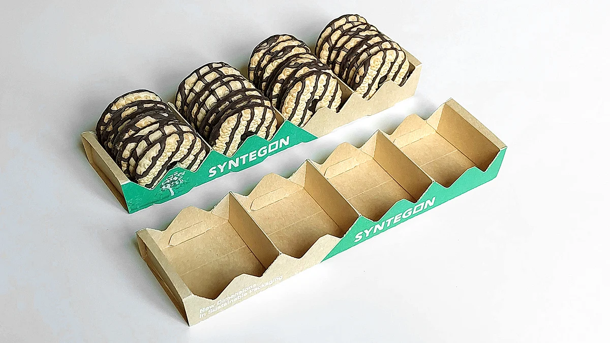 The Kliklok ACE carton erector uses the innovative lock-style technology to create paper trays without any adhesives, thus replacing plastic with paper-based materials.
